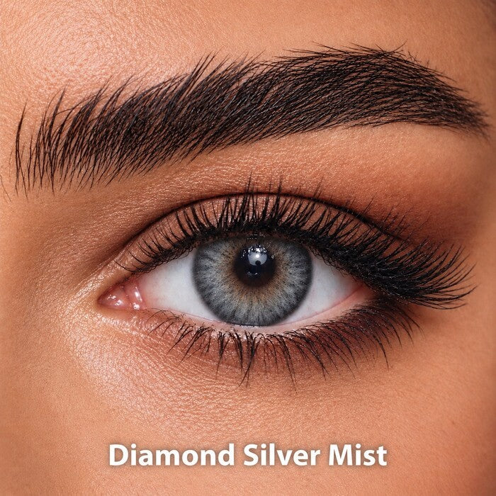Bella Diamond Collection Diamond Silver Mist coloured contact lens worn on a brown eye