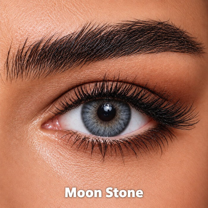 Bella Diamond Collection Moon Stone coloured contact lens worn on a brown eye