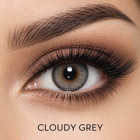Bella Elite Collection Cloudy Grey coloured contact lens worn on a brown eye
