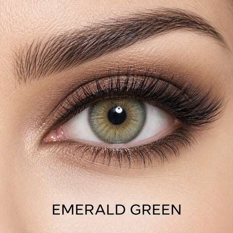 Bella Elite Collection Emerald Green coloured contact lens worn on a brown eye