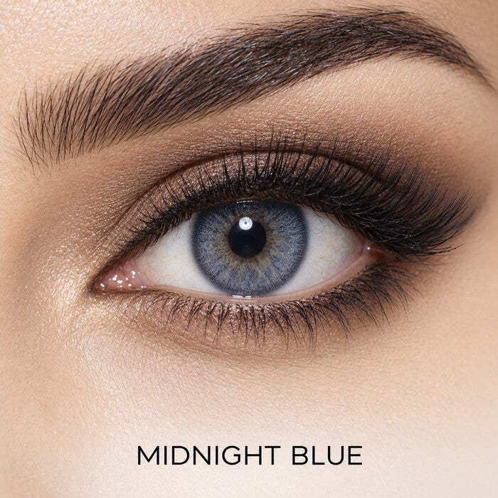 Bella Elite Collection Midnight Blue coloured contact lens worn on a brown eye