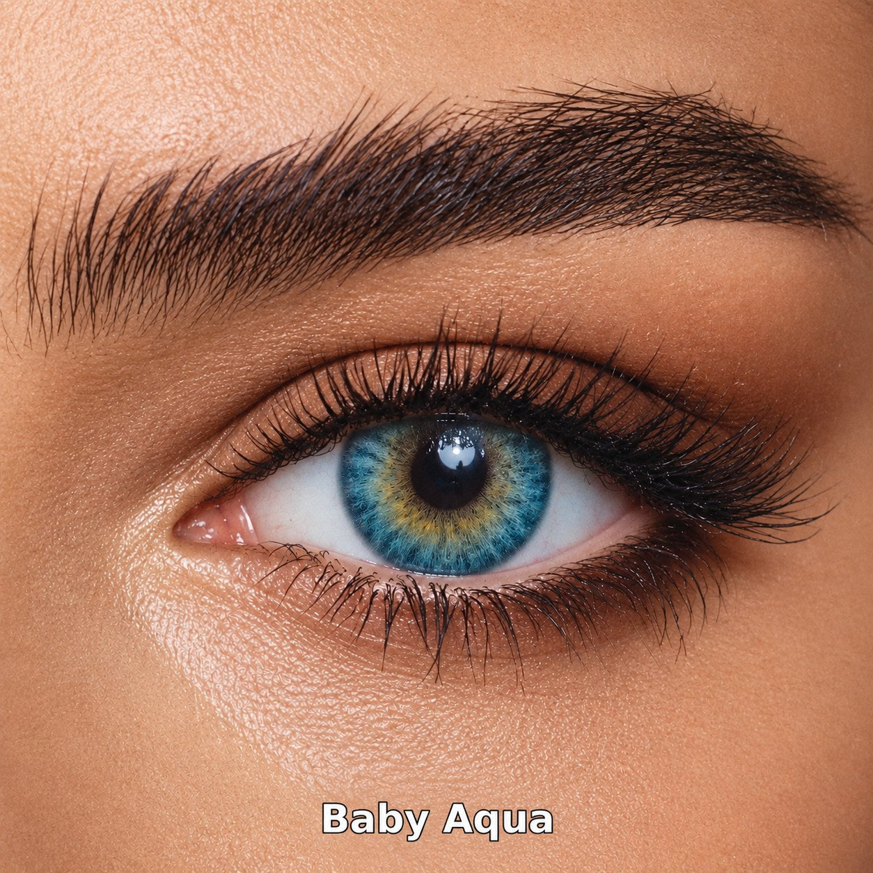 FreshKon Colors Fusion Baby Aqua coloured contact lens worn on a brown eye