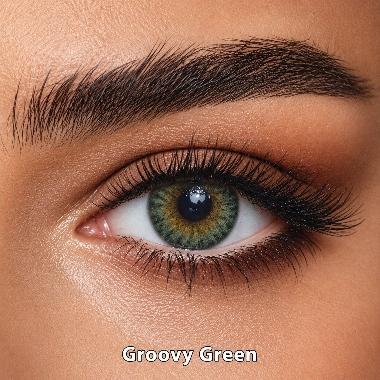 FreshKon Colors Fusion Groovy Green coloured contact lens worn on a brown eye