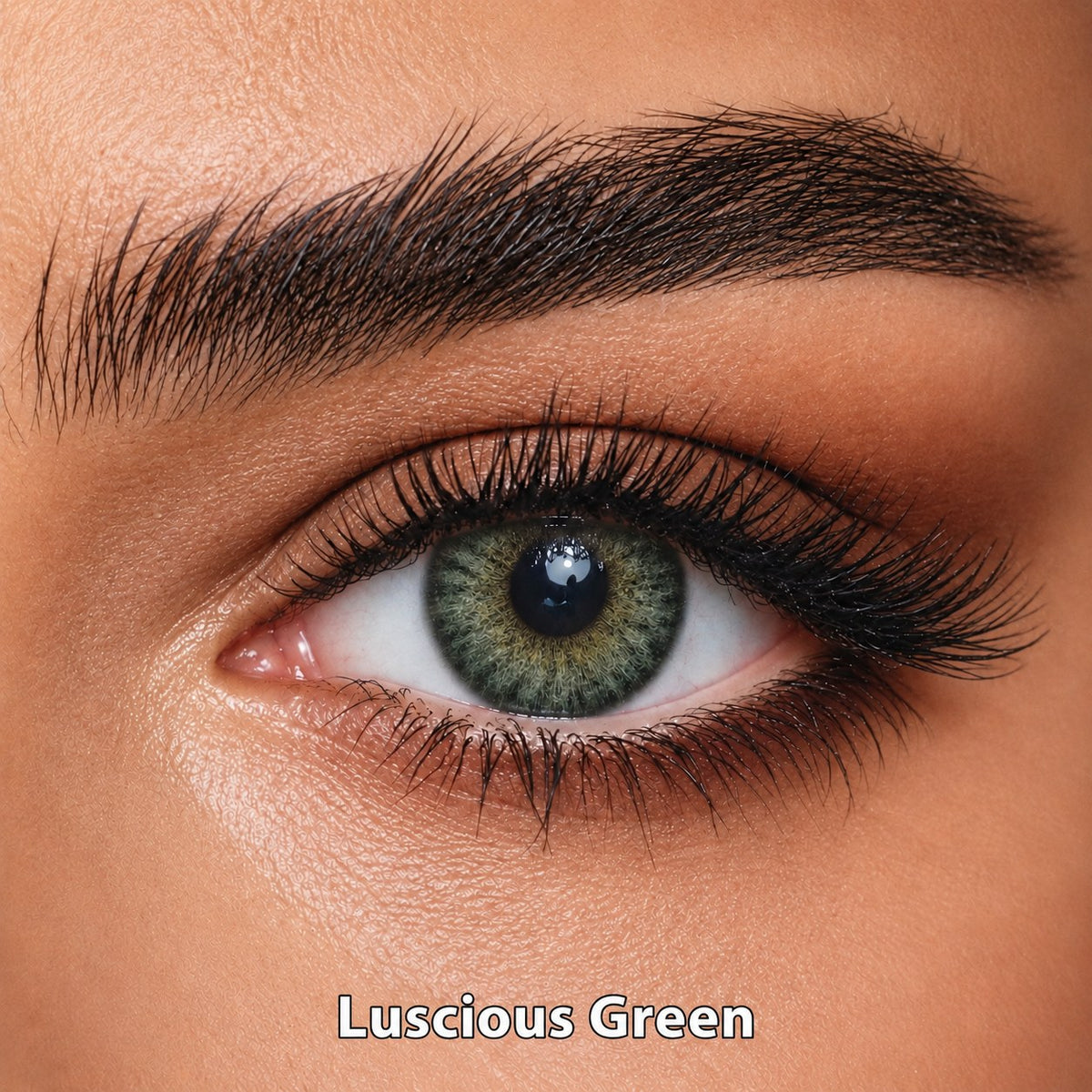 FreshKon Mosaic Luscious Green coloured contact lens worn on a brown eye
