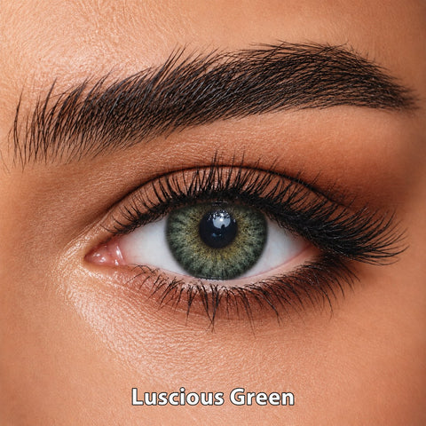 FreshKon Mosaic Luscious Green coloured contact lens worn on a brown eye