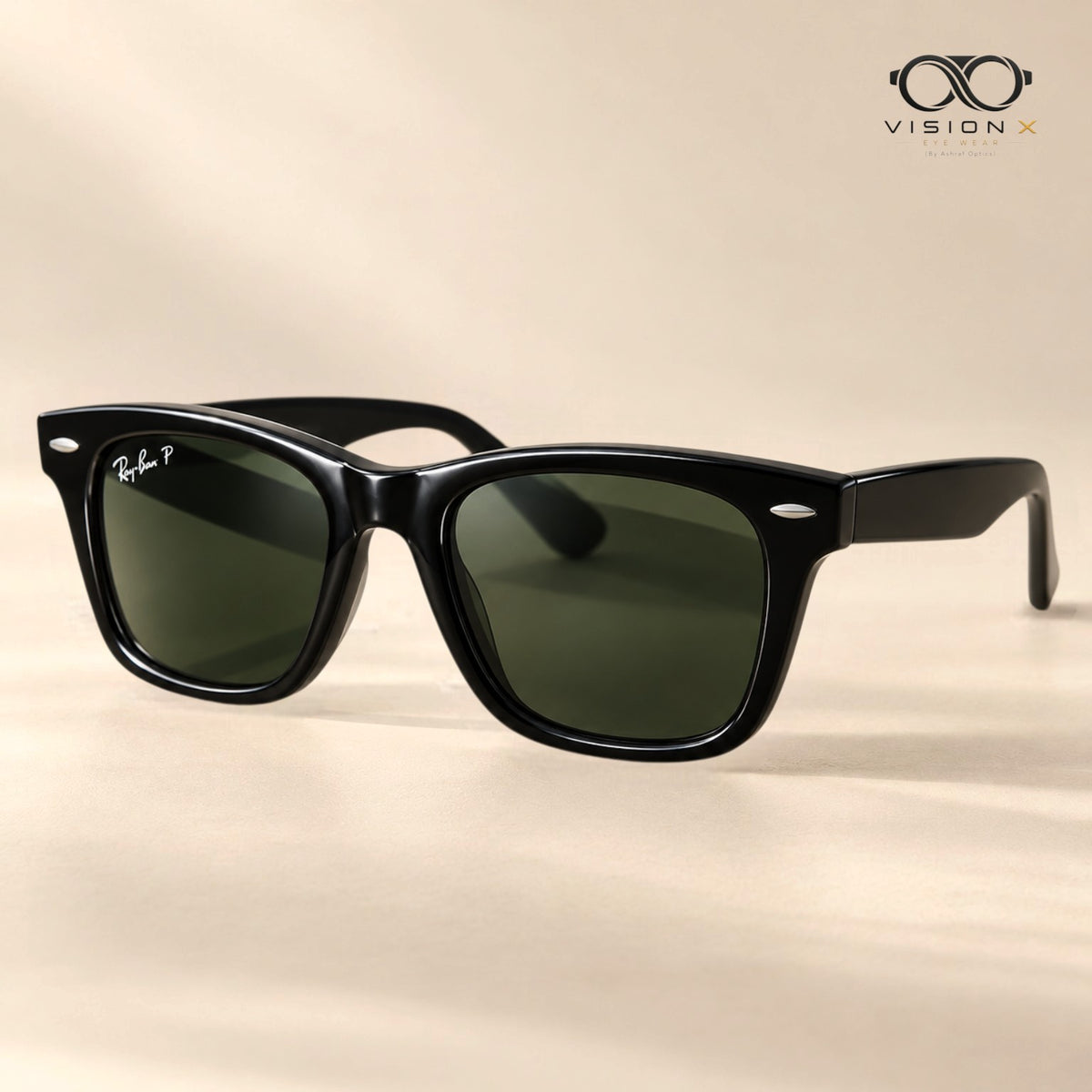 VisionX EyeWear Ray-Ban Wayfarer sunglasses featuring a thick black acetate frame and classic green lenses.